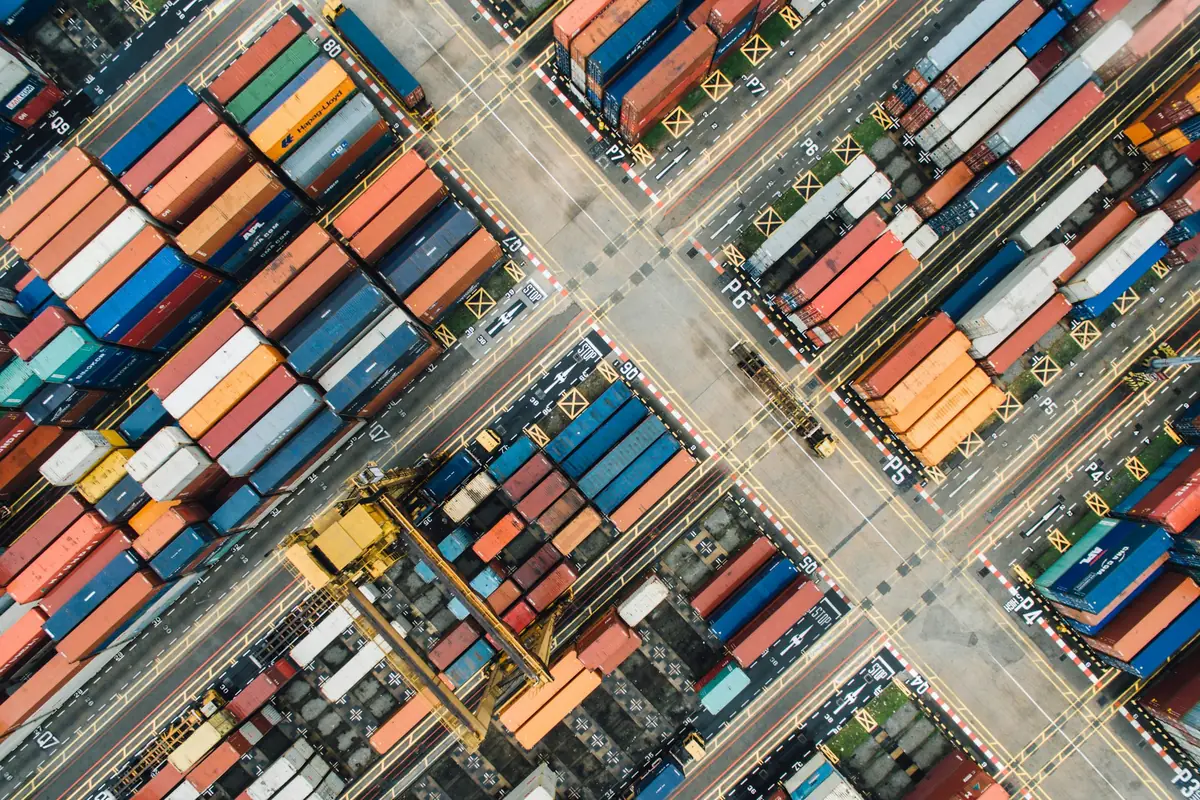 Aerial view of stacked shipping containers at a port